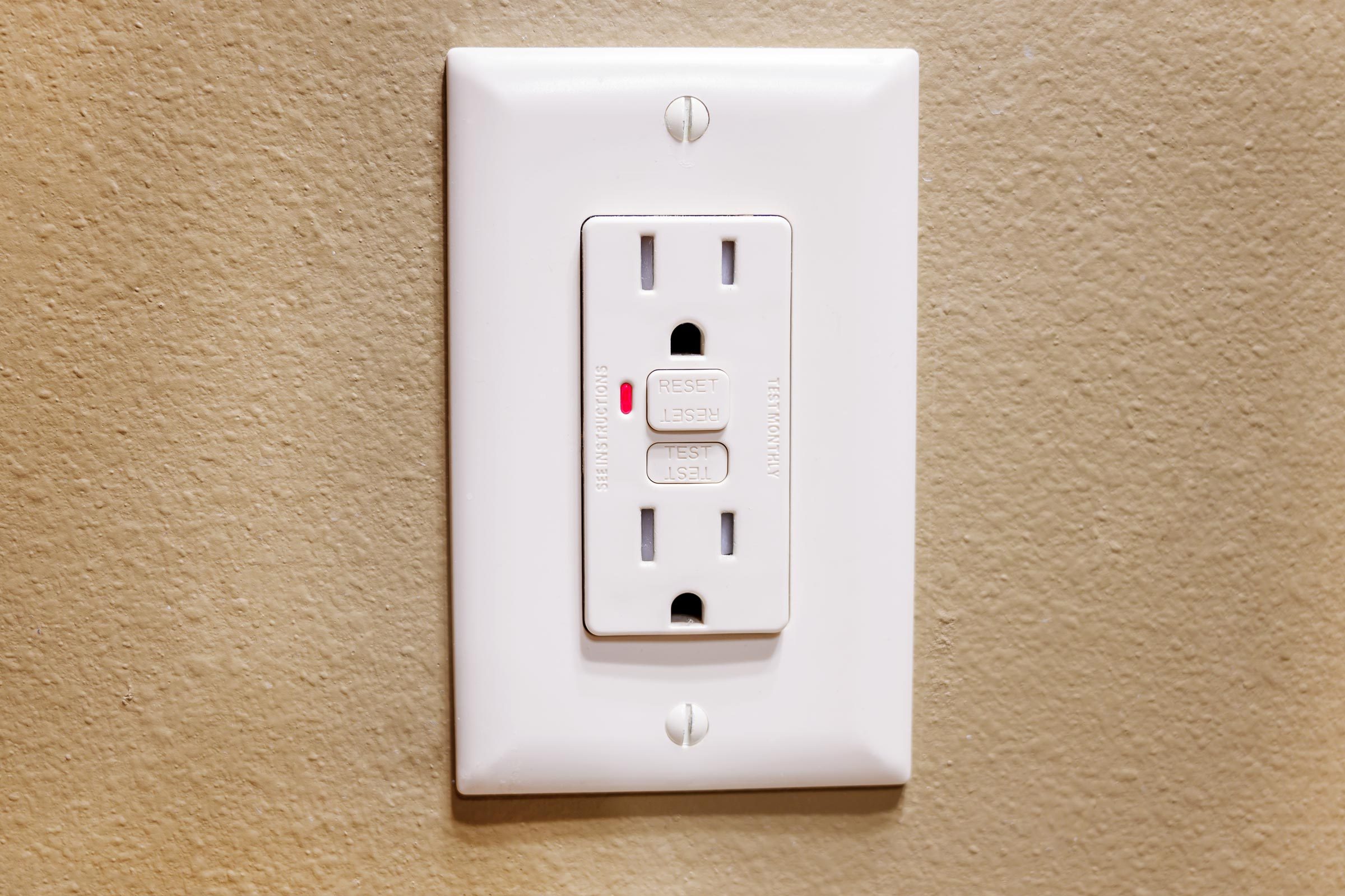 GFCI outlet on a wall