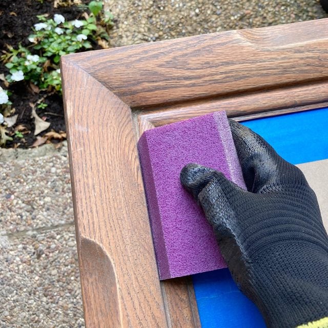 sanding wooden frame