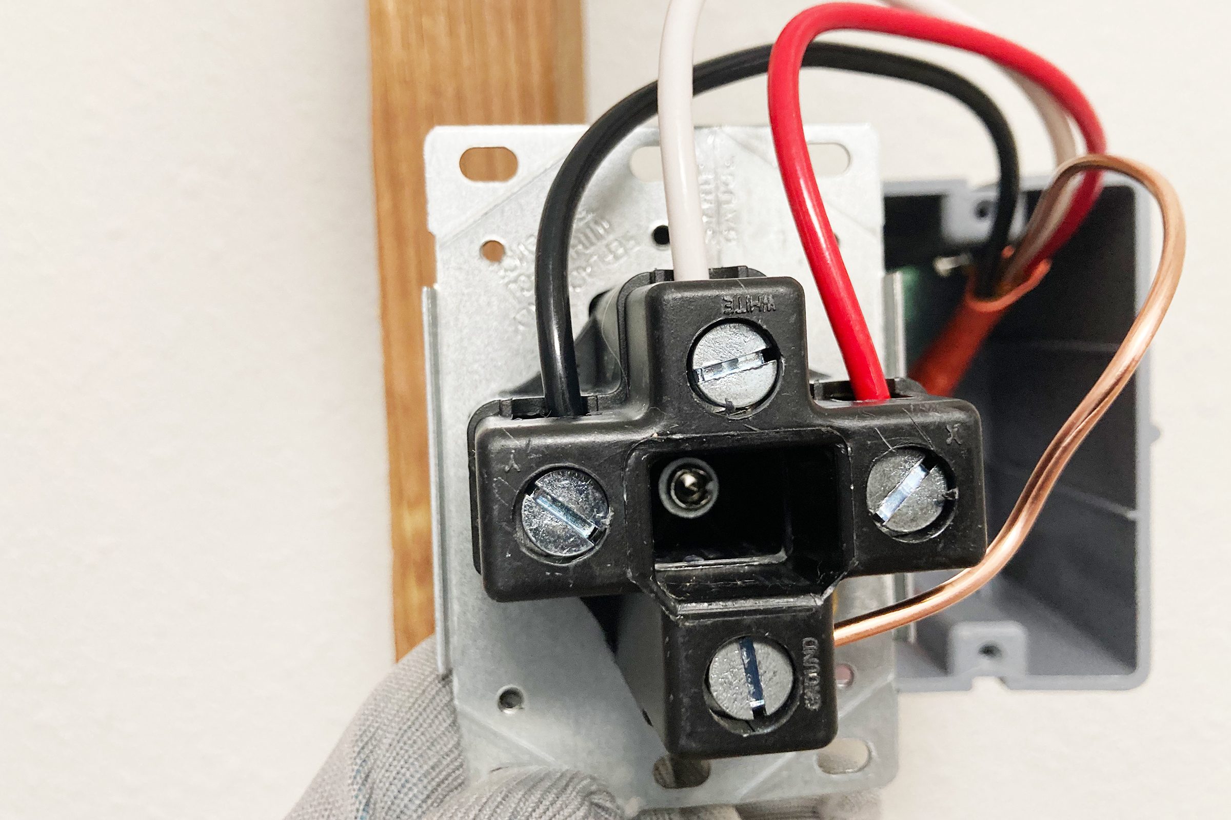 Attach neutral and hot wires