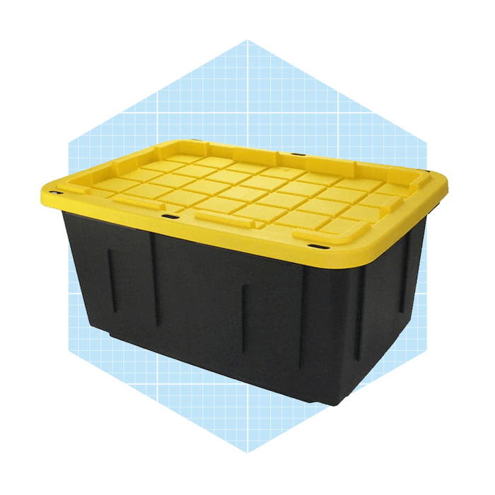 A black storage bin with a yellow lid sits against a light blue background, designed for organizing and transporting items.