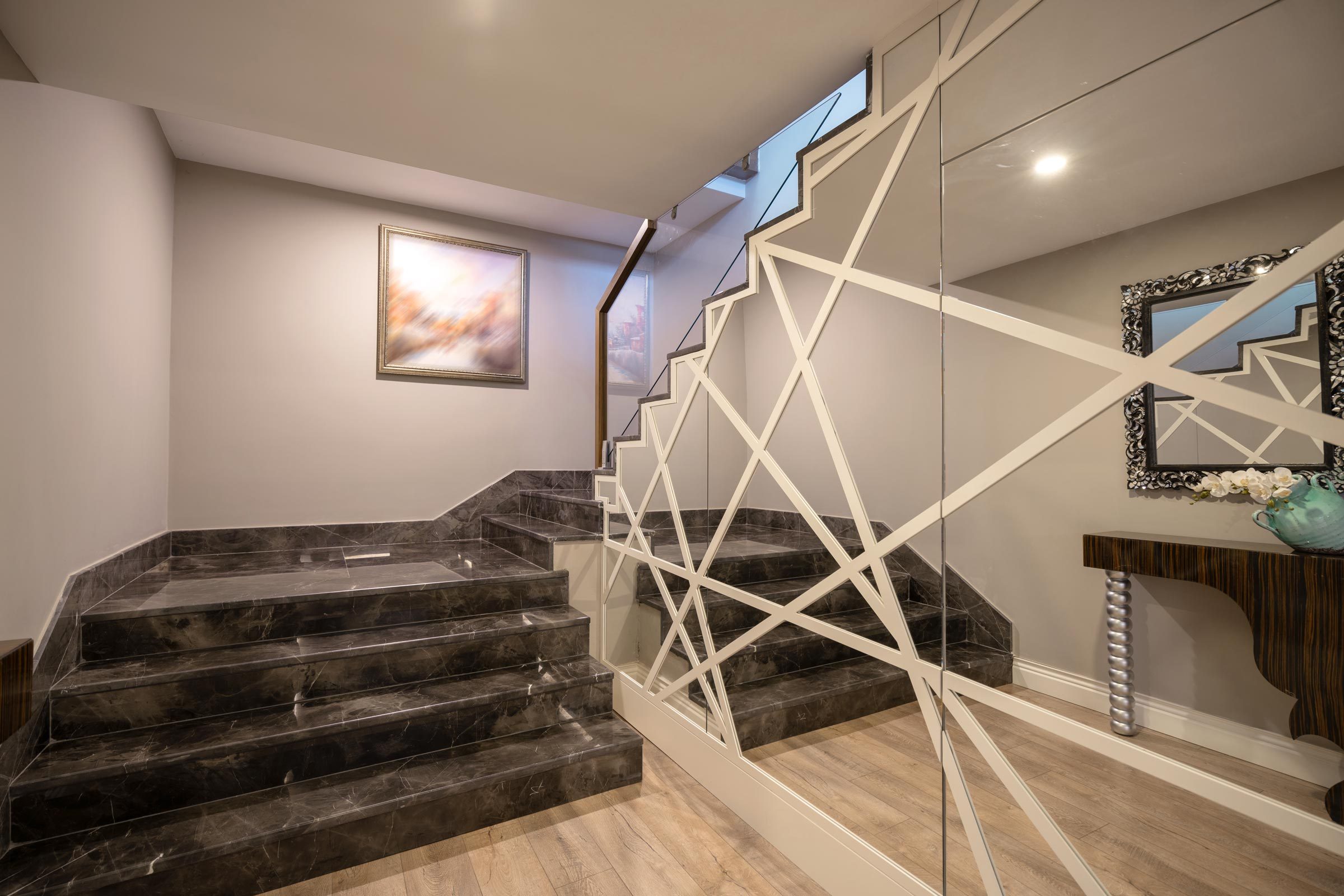Mirror wall In a finished contemporary Basement
