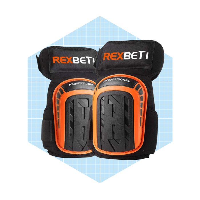 Kneepads are displayed, showcasing a black and orange design on a light blue grid background, indicating protective gear for professional use.