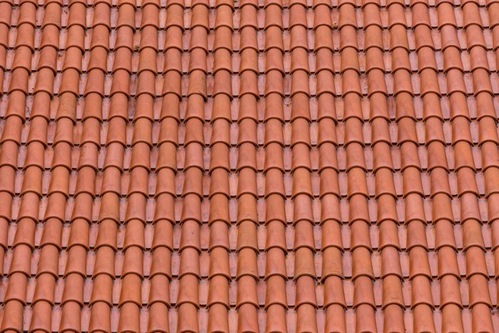 Closeup of the red clay roof tiles as a background