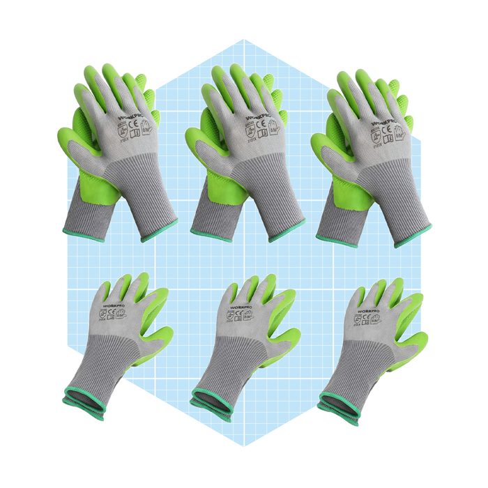 Six pairs of work gloves rest on a light blue grid background, showcasing a gray and bright green design, ready for use in various tasks.