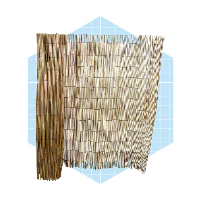 Two bamboo privacy screens stand side by side, with one slightly taller. They are set against a light blue geometric background.
