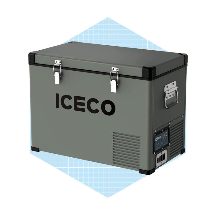 A rugged, portable cooler with locking clamps stores perishable items, set against a light blue grid background, suitable for outdoor activities.