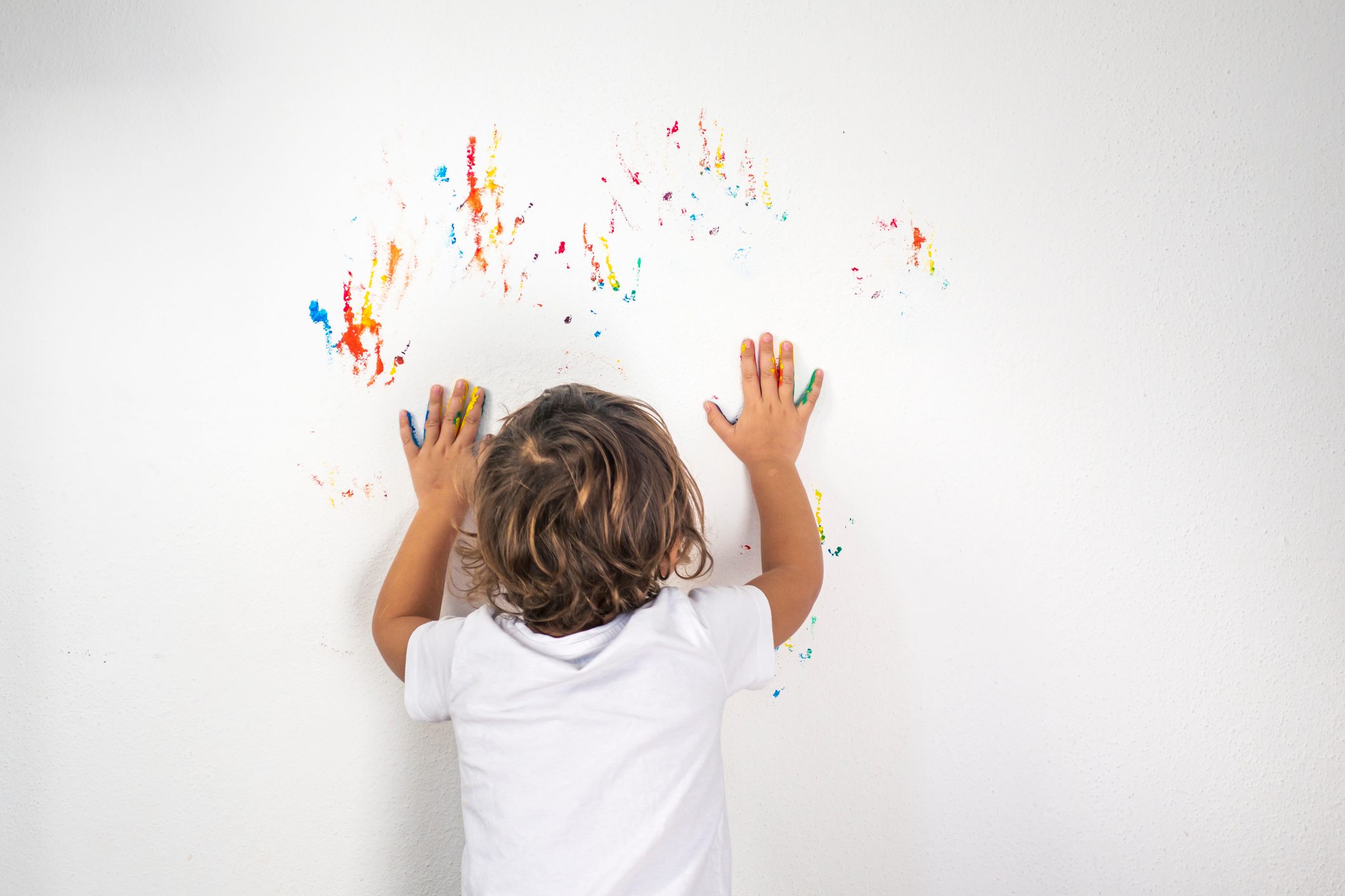 Boy Showing Colorful Paint on His Hands