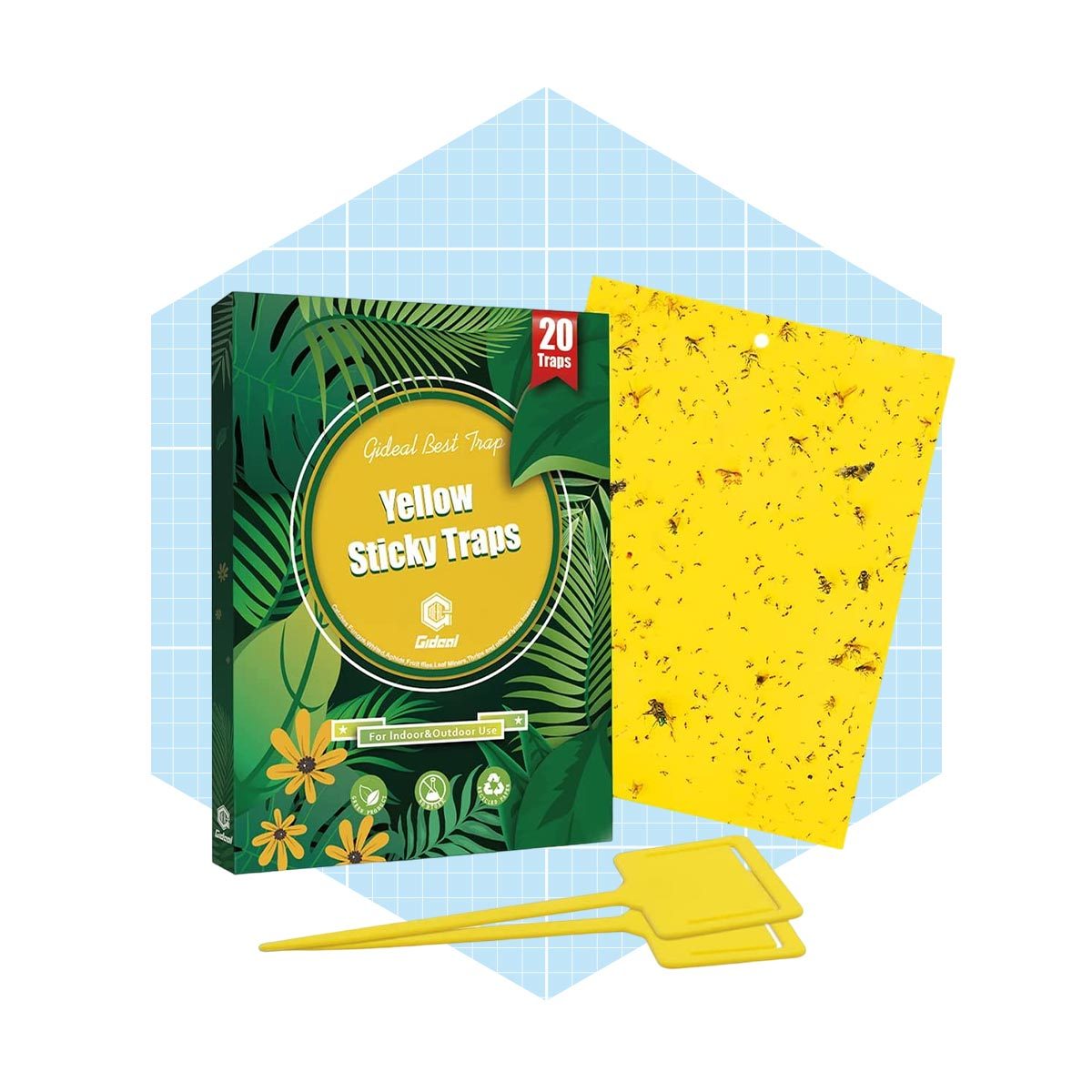 A box of yellow sticky traps lies next to a yellow trap covered in insects, accompanied by a yellow holder, set against a light blue background.