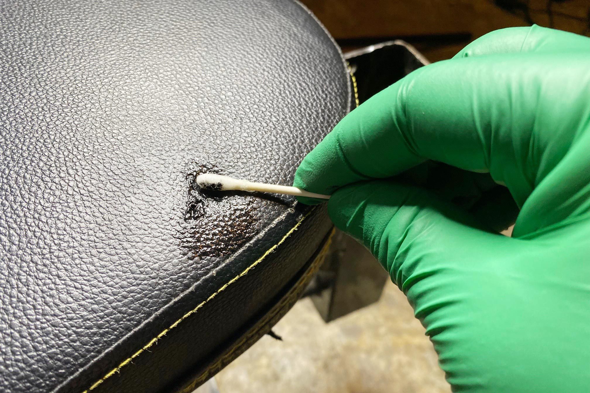 using a Q-tip to smooth the compound out