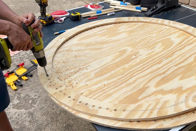 drilling holes in plywood circle around the edges