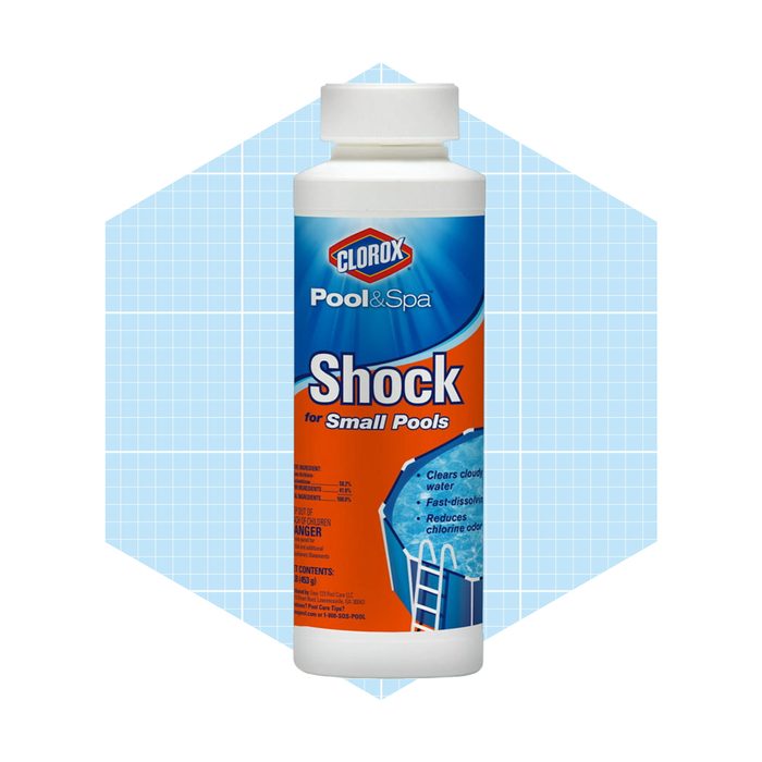 A bottle of Clorox Pool & Spa Shock for small pools rests against a light blue geometric background, promoting water clarity and quick dissolution.