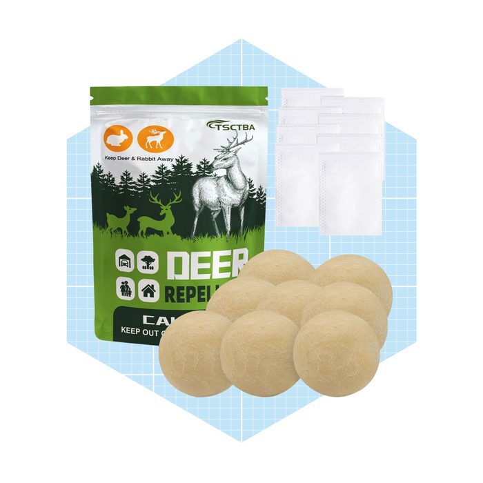 A pack of deer repellent balls sits next to a green bag labeled 