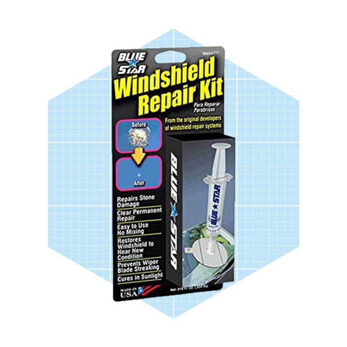 A windshield repair kit is displayed in packaging, promising to fix stone damage and restore the windshield