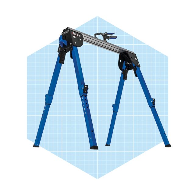A blue adjustable stand with three legs supports a tracking mechanism, set against a light blue grid background.