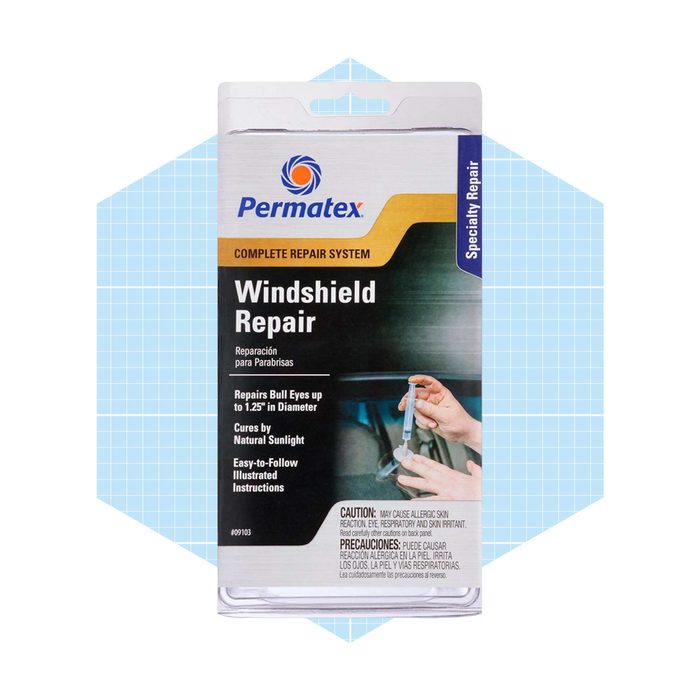 A packaging for windshield repair, showing an individual holding a repair tool; blue geometric background highlights the product