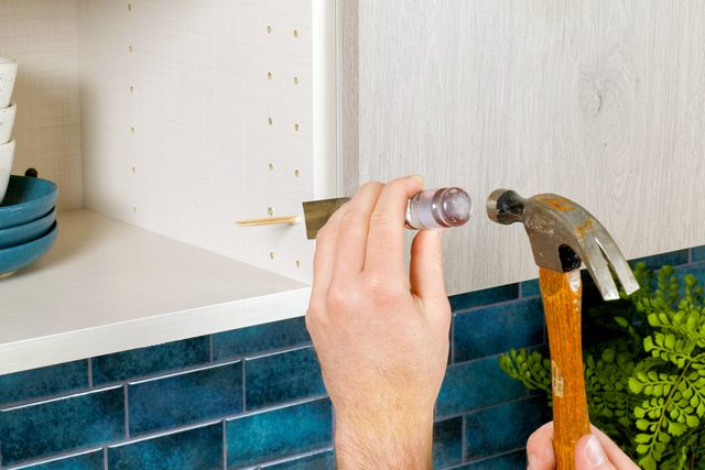 Breaking off toothpicks with a chisel and hammer