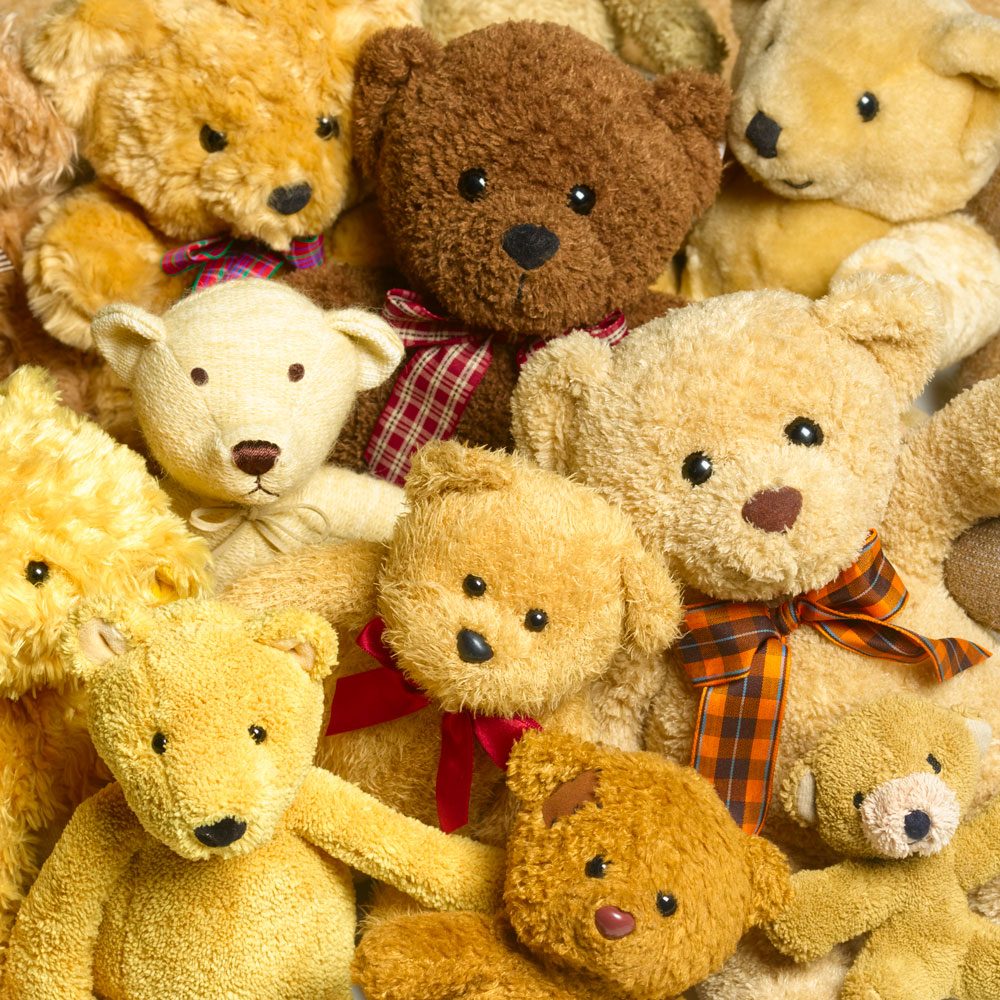 Collection Of Teddy Bears piled on top of one another