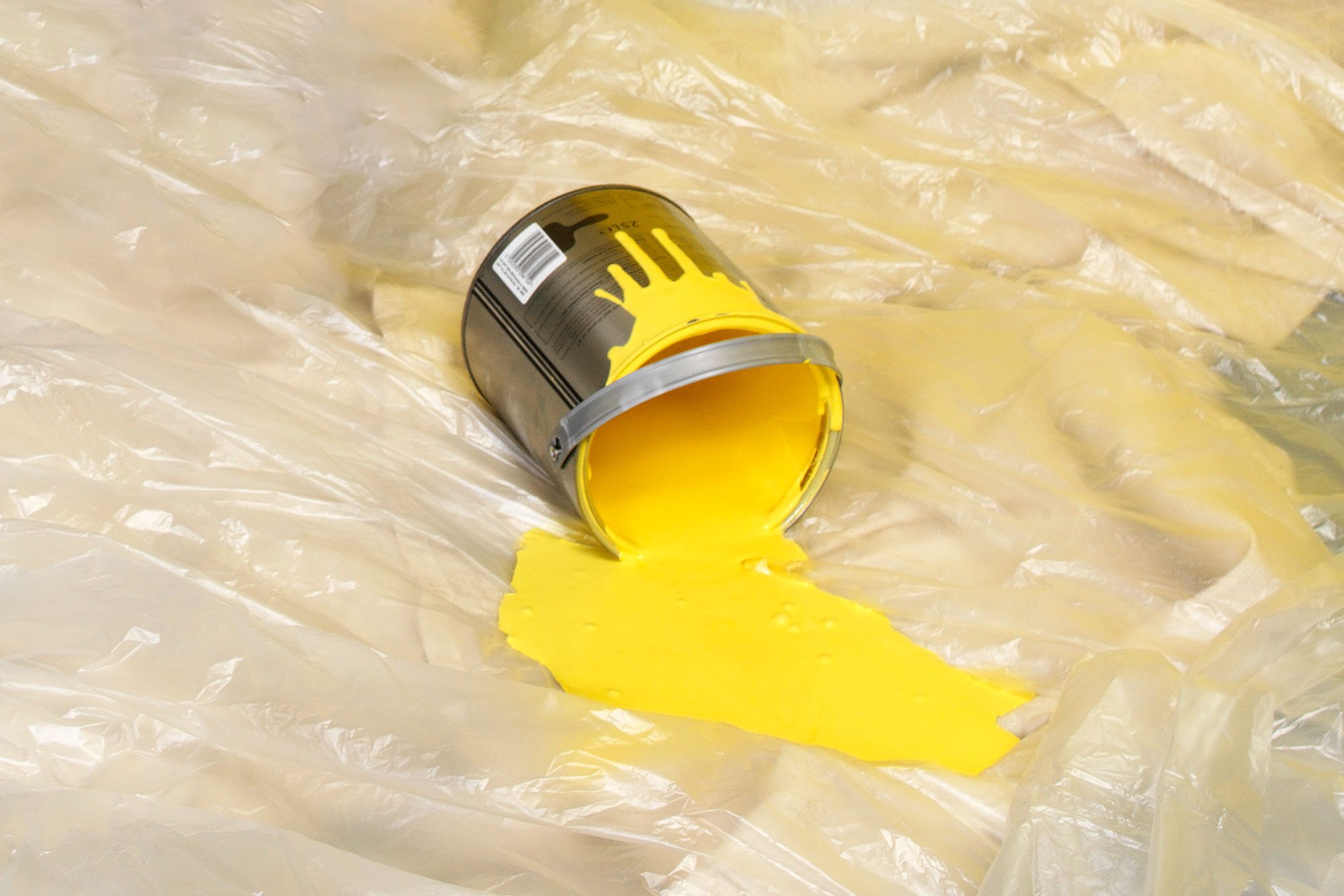 Spilled Yellow Paint Bucket