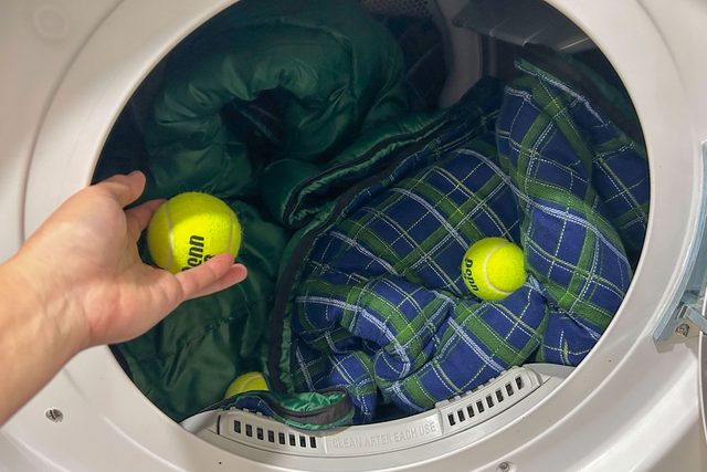 Toss in Tennis Balls to fluff and separate sleeping bag