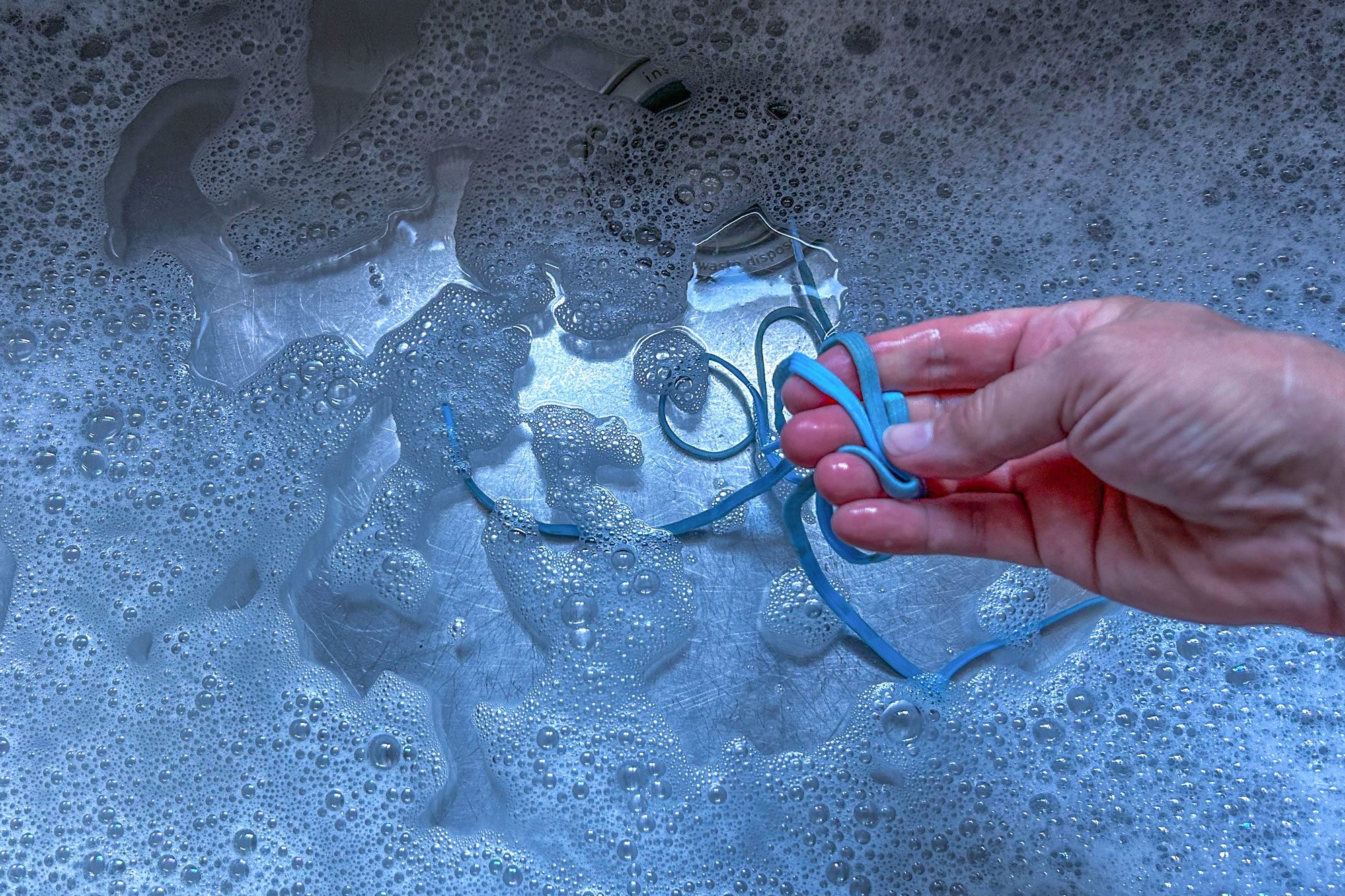 Handwash the laces in sink with warm and soapy water