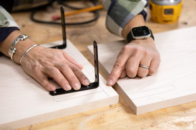 How To Build A Bathroom Vanity Route “L” bracket channels