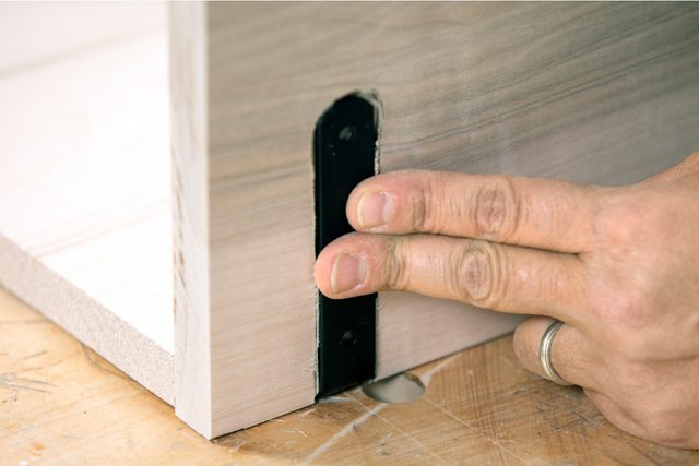 How To Build A Bathroom Vanity Add brackets under lower shelf