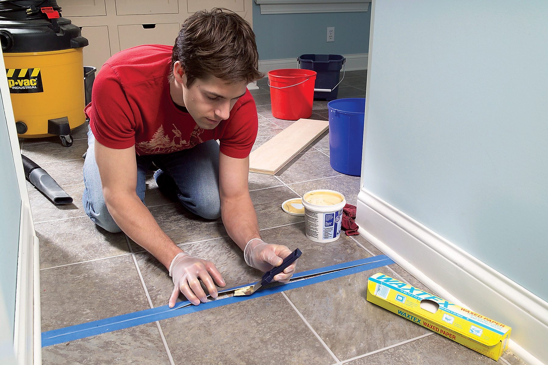 Stick adhesive under the loose flooring