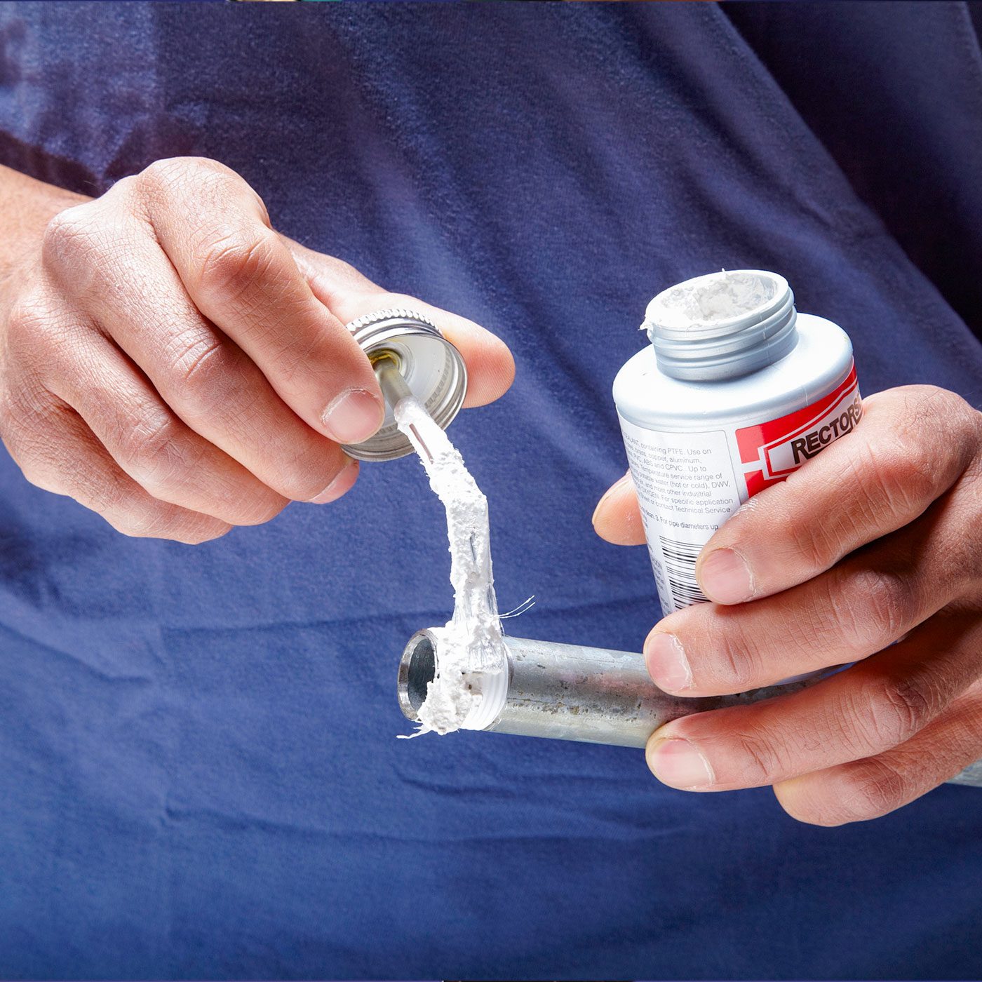 Apply pipe dope to male threads