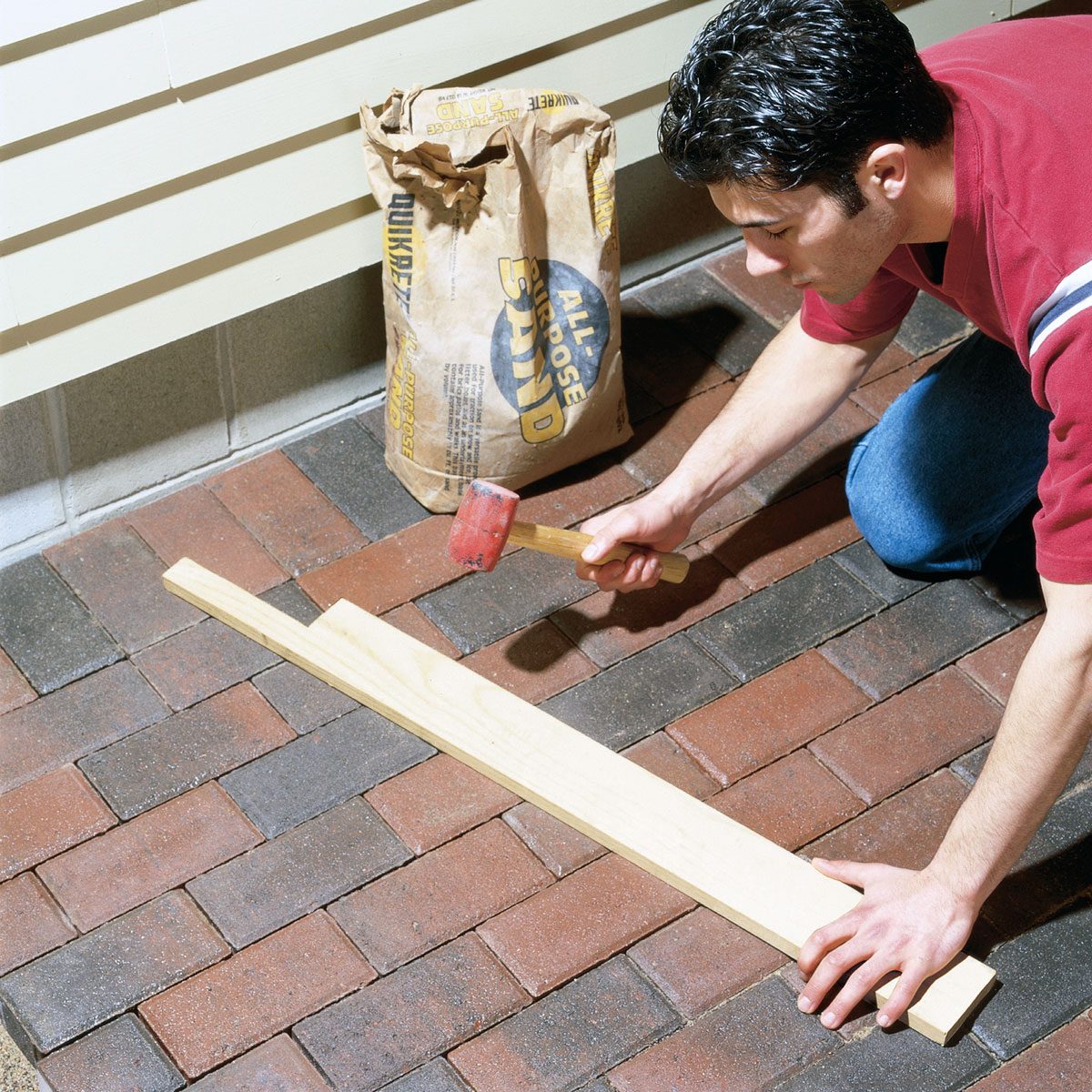 Tapping down pavers