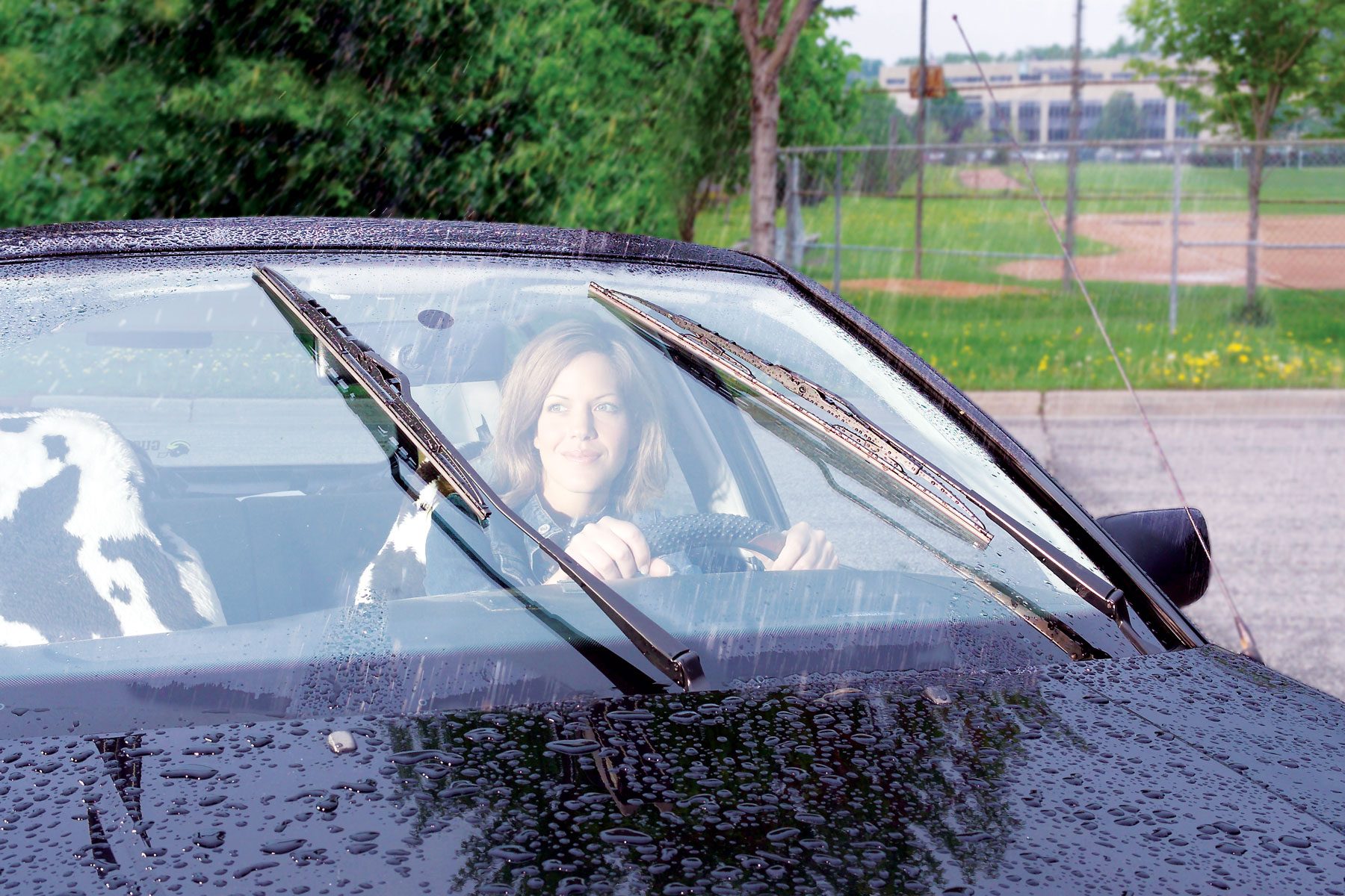 A women sitting in her car