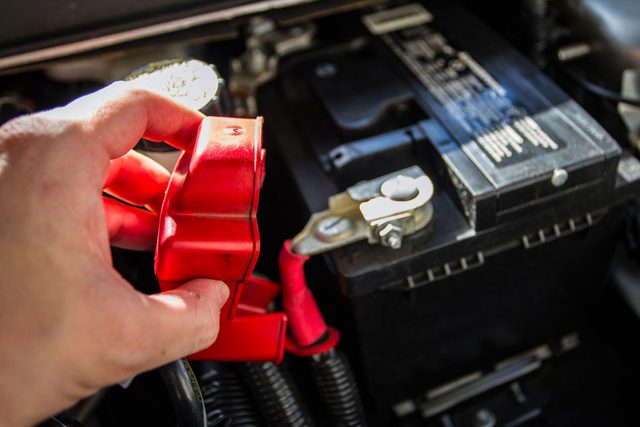 Mechanic Checking Car Battery