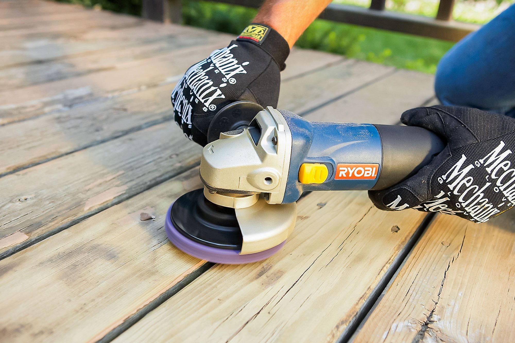 Sanding the Deck Stain with angel grinder