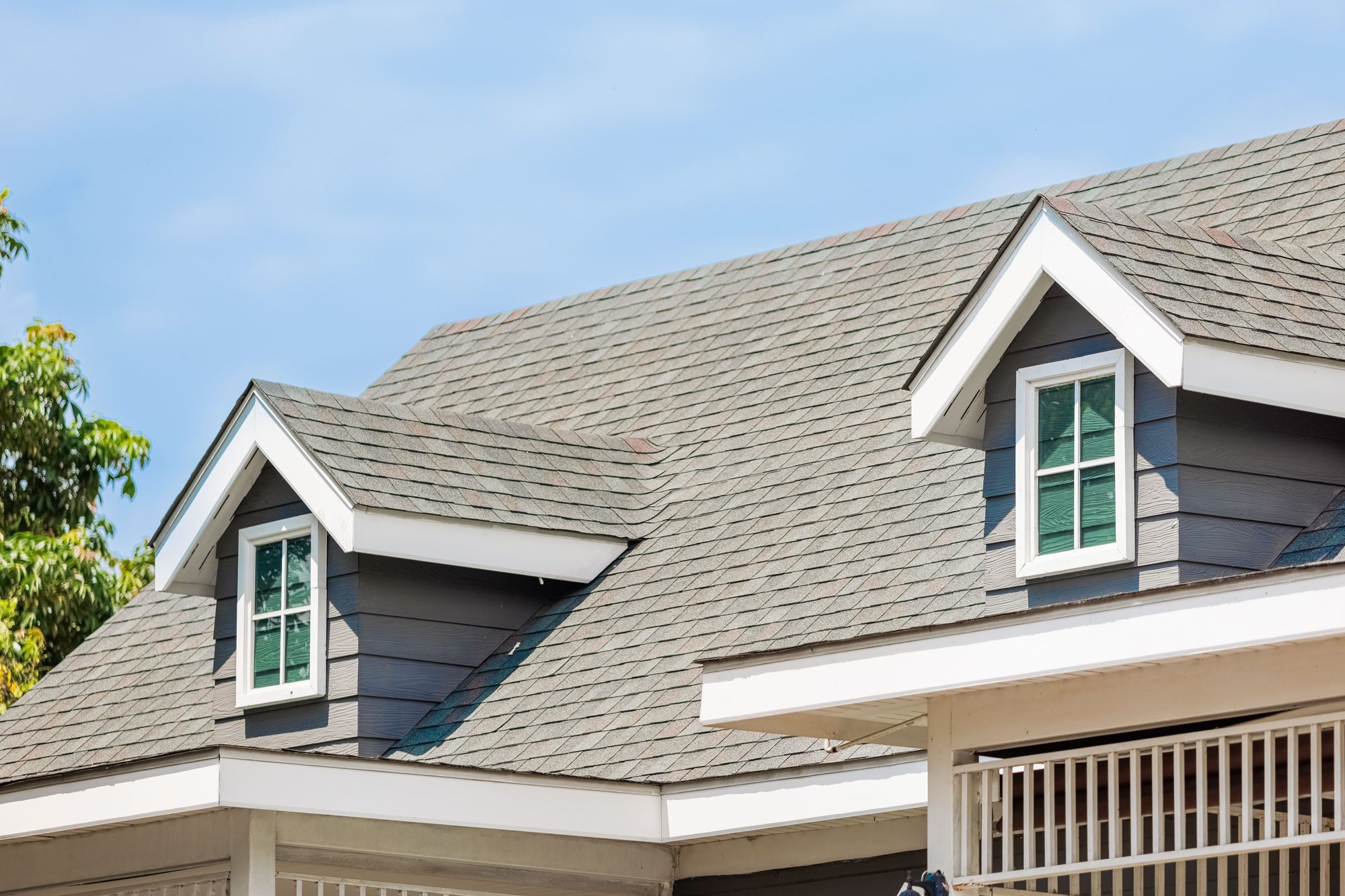 Roof Shingles With Garret House On Top Of The House