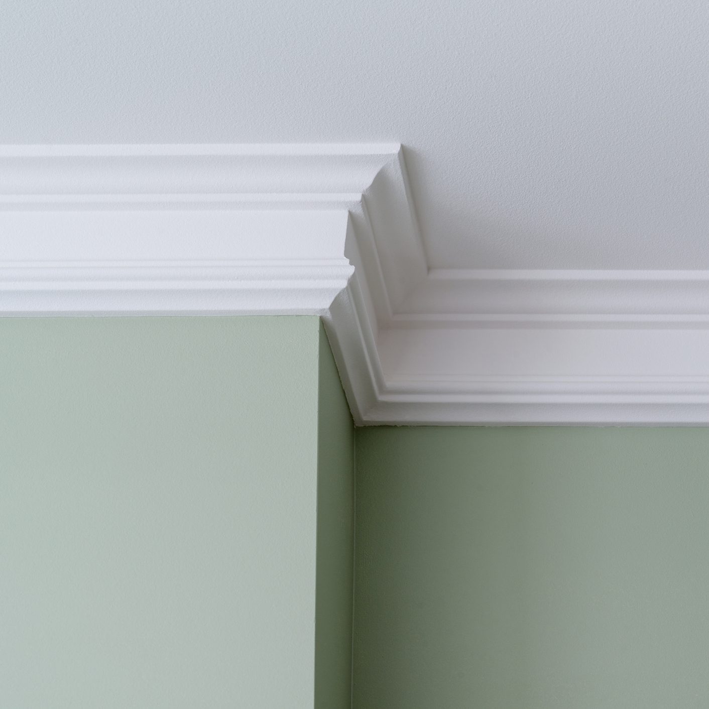 Details in the interior. Ceiling moldings, part of intricate corner.