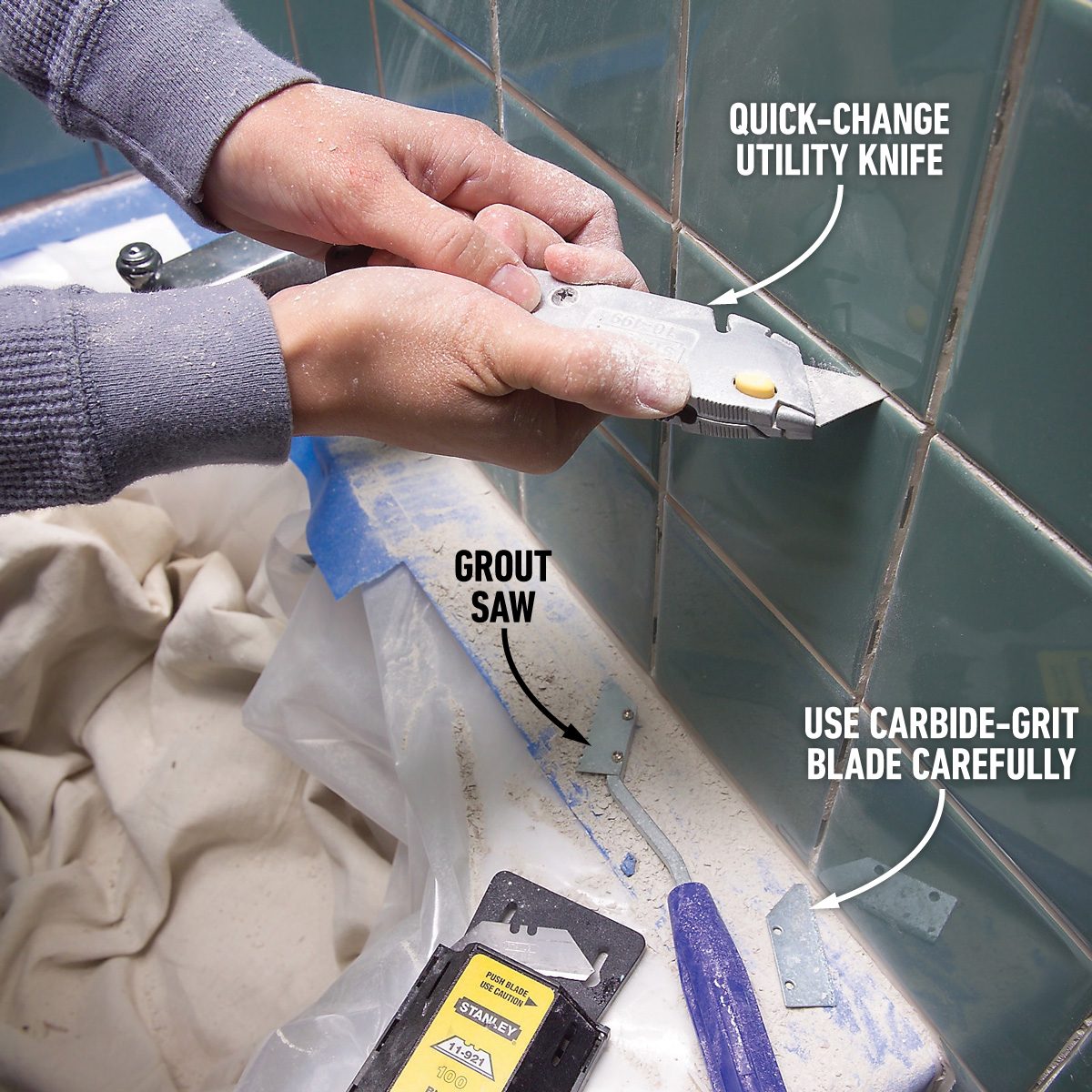 Slice out caulk and scratch out grout