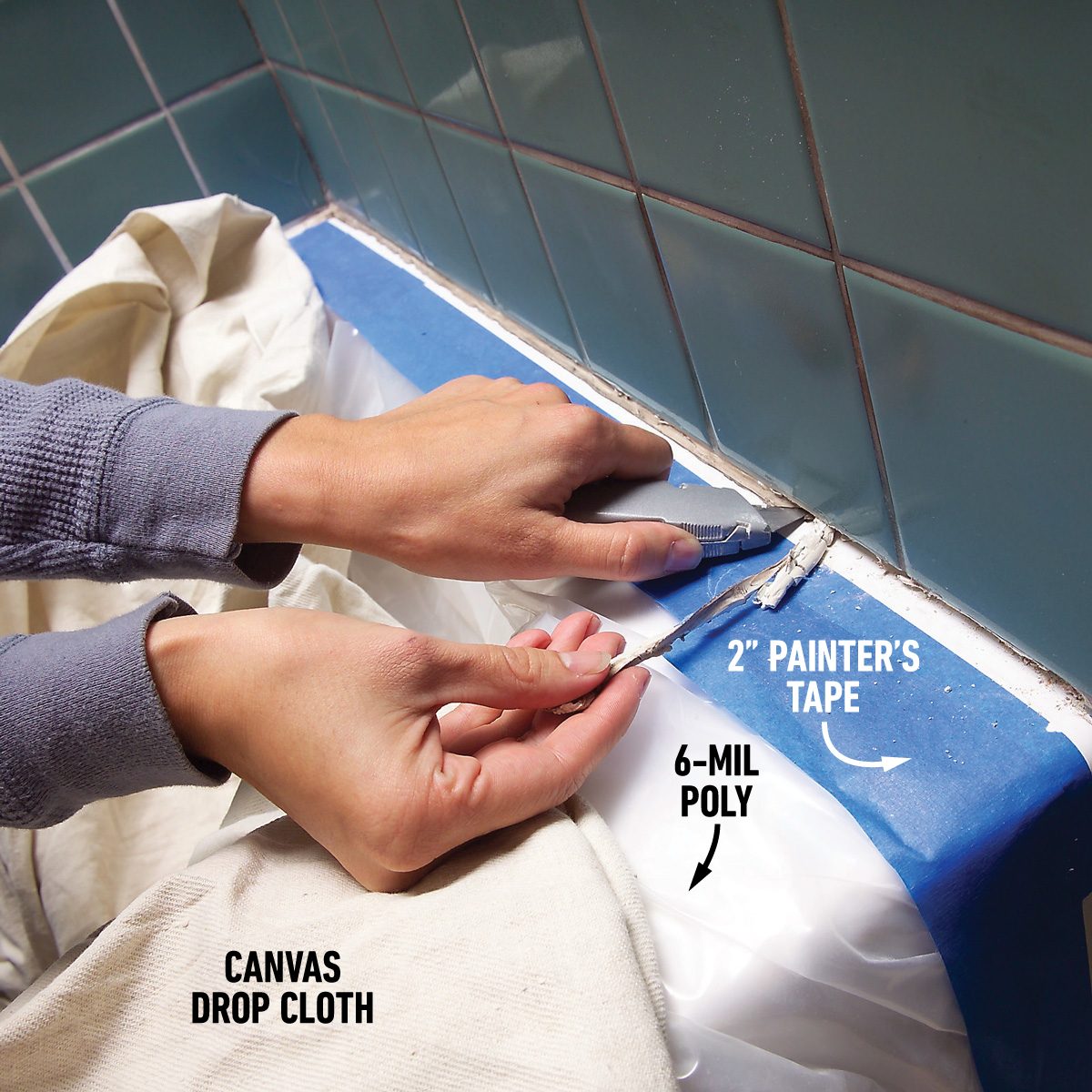 Slice out caulk and scratch out grout