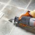How to Remove Grout With a Reciprocating Saw or an Oscillating Tool