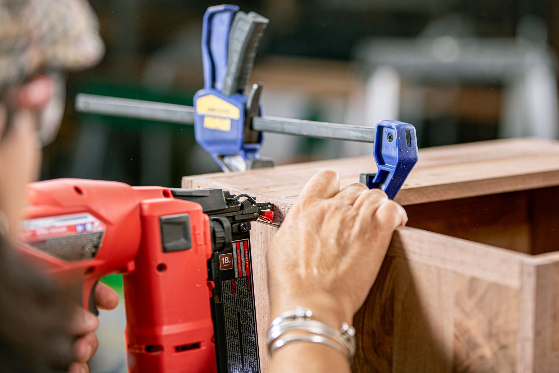 slats being installed along the bottom edge of the crate