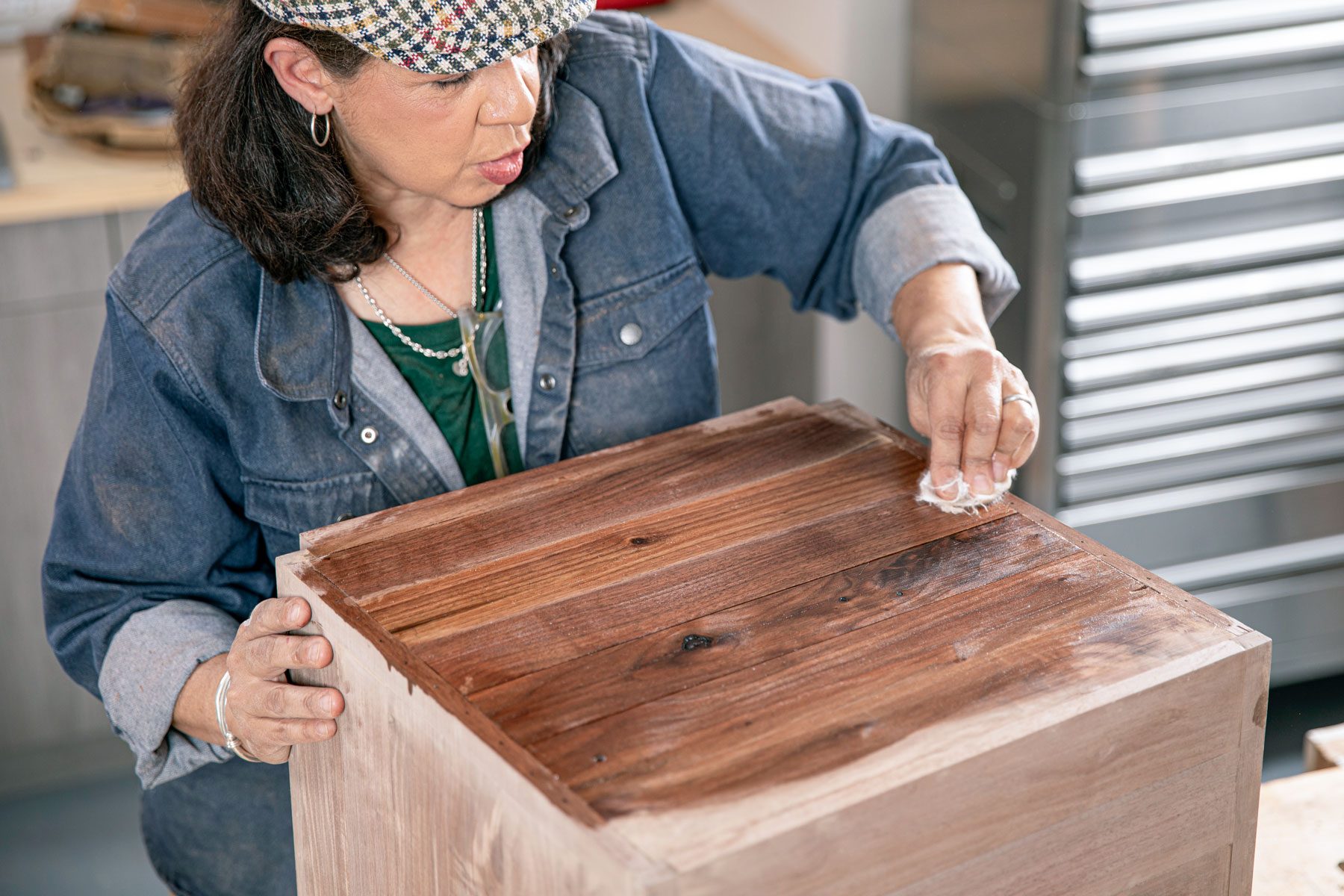 applying walnut oil to the crate