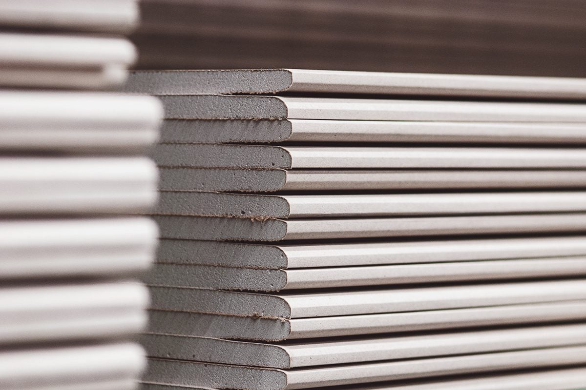 Wallboards Plasterboard Drywall Standard Gypsum Panels Stacked In Hardware Store Closeup