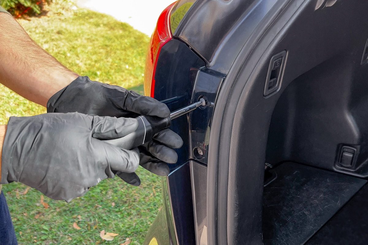 unscrewing taillight assembly