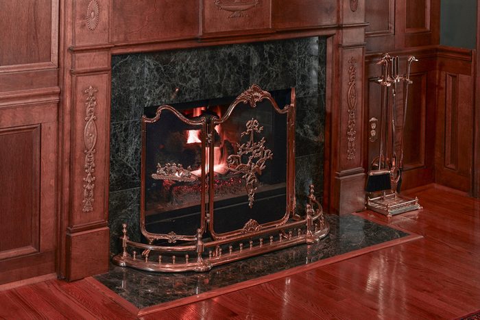 mantle and fireplace made of cherry wood