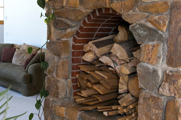 fireplace filled with wood
