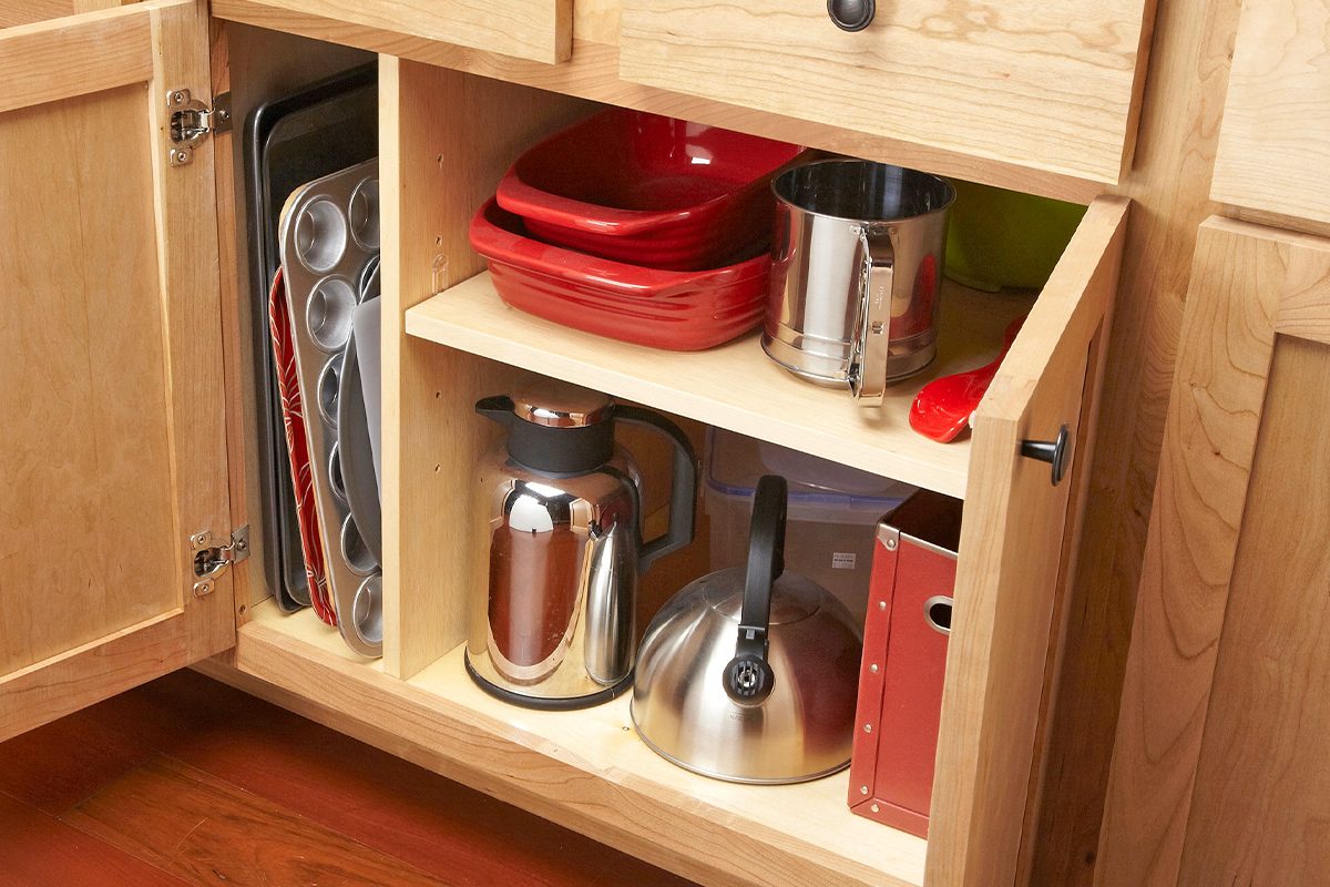 Easy Diy Projects To Increase Kitchen Cabinet And Drawer Storage Add a Divider for Upright Storage
