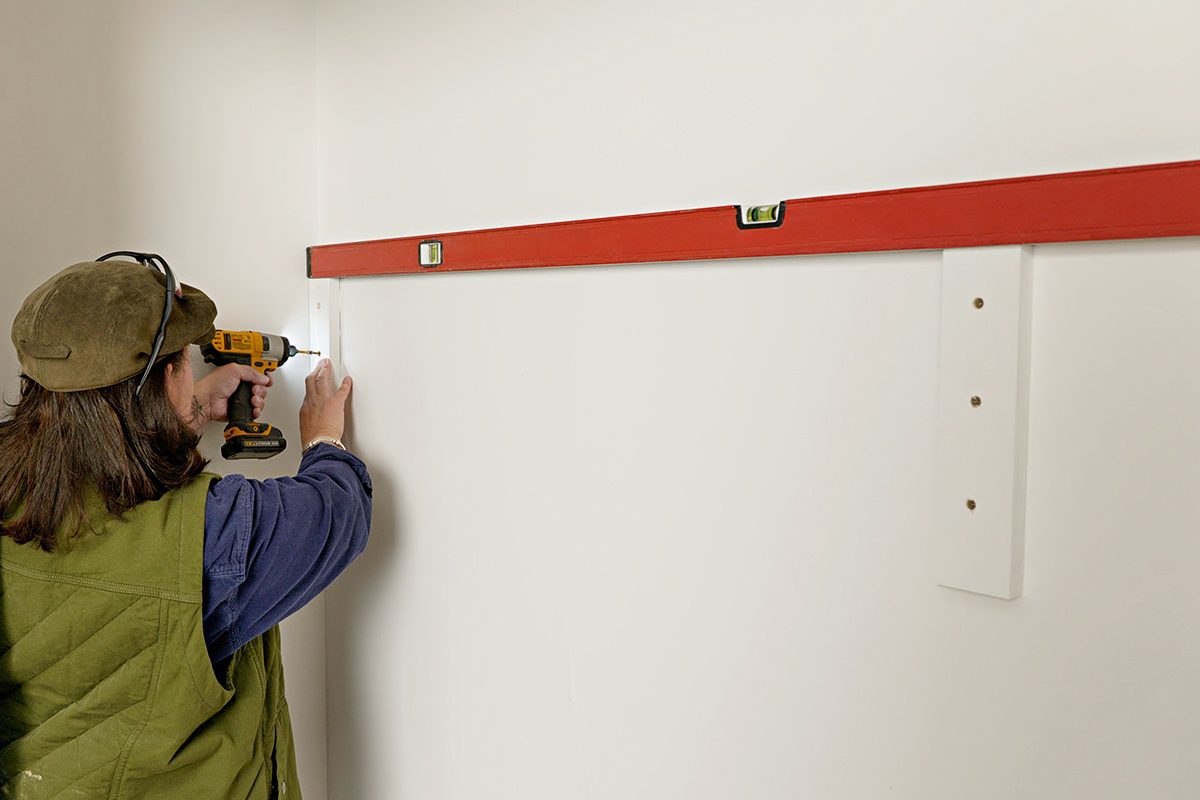 Hang A Long Rod For Clothes Install wood bracket supports