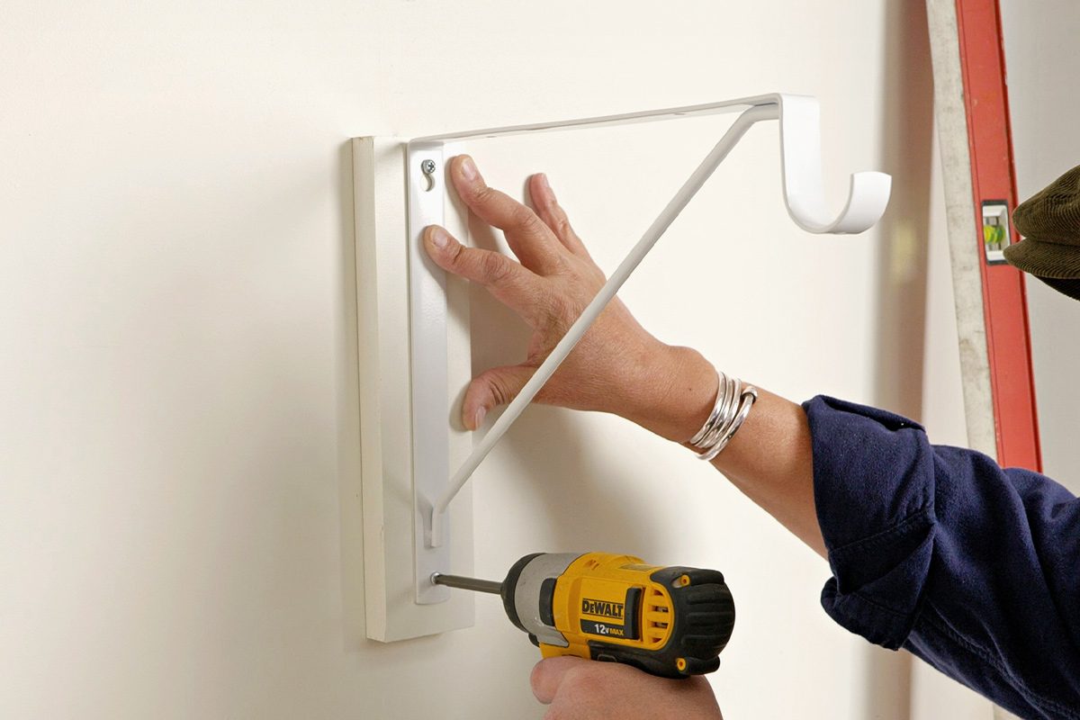 Hang A Long Rod For Clothes Install closet rod brackets