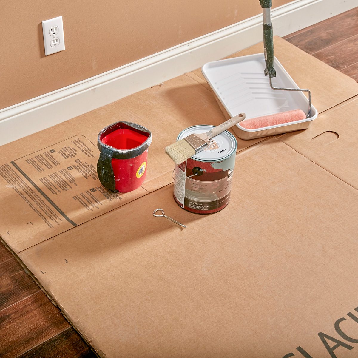 cardboard under paint cans to protect floors