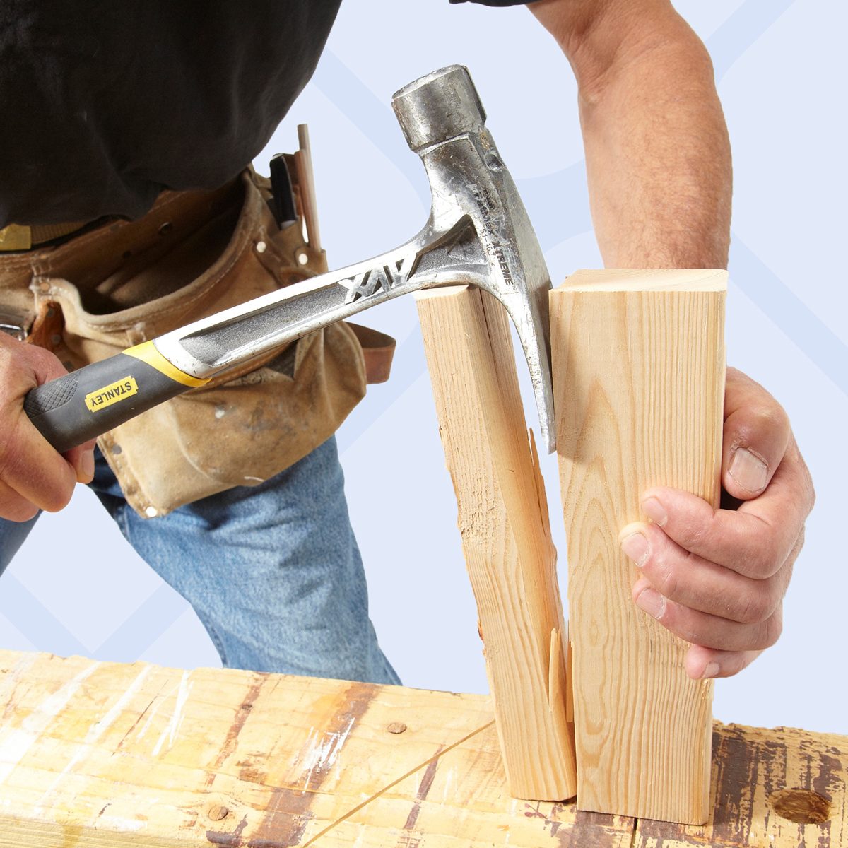 splitting lumber with hammer claw