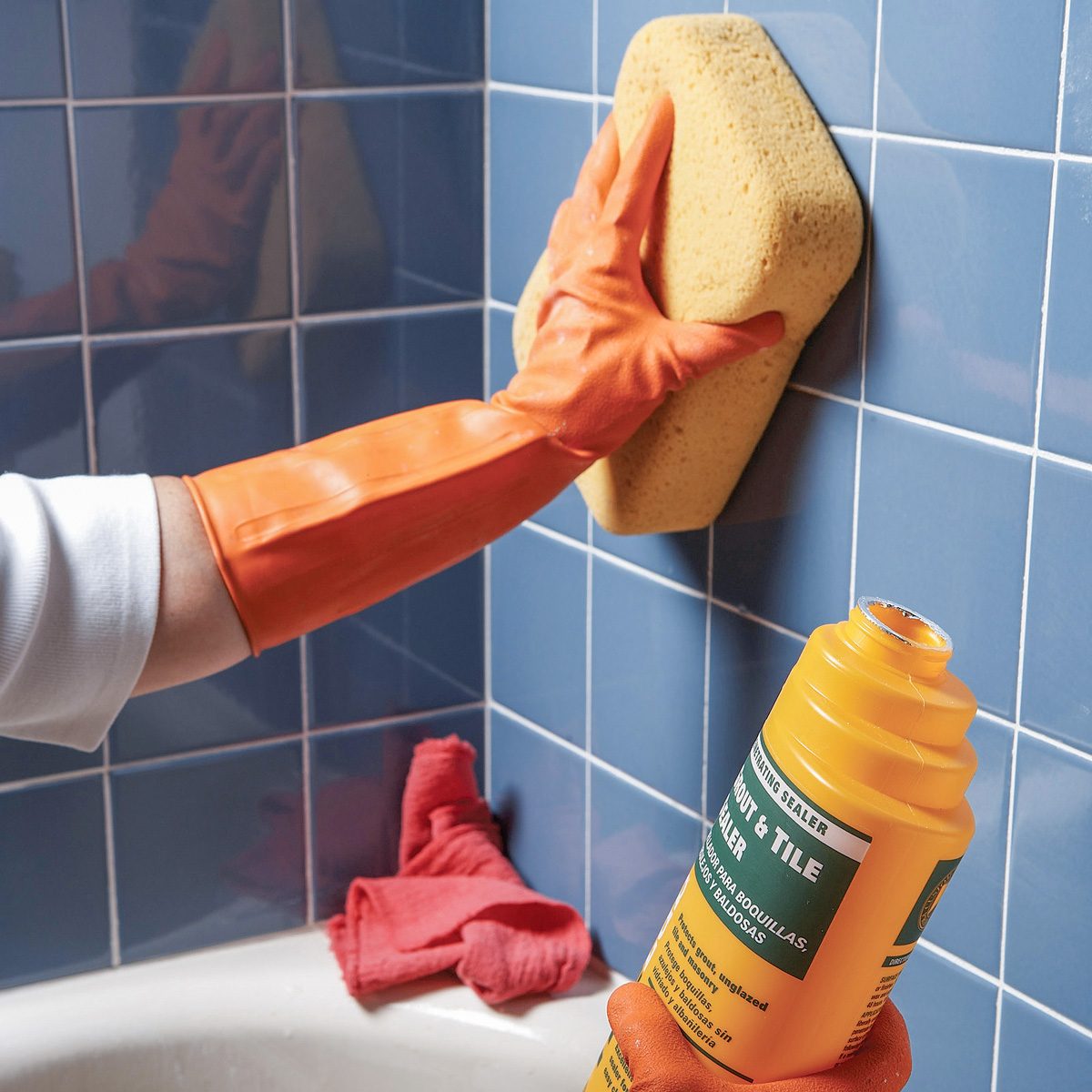 grouting wall with grout and tile sealant