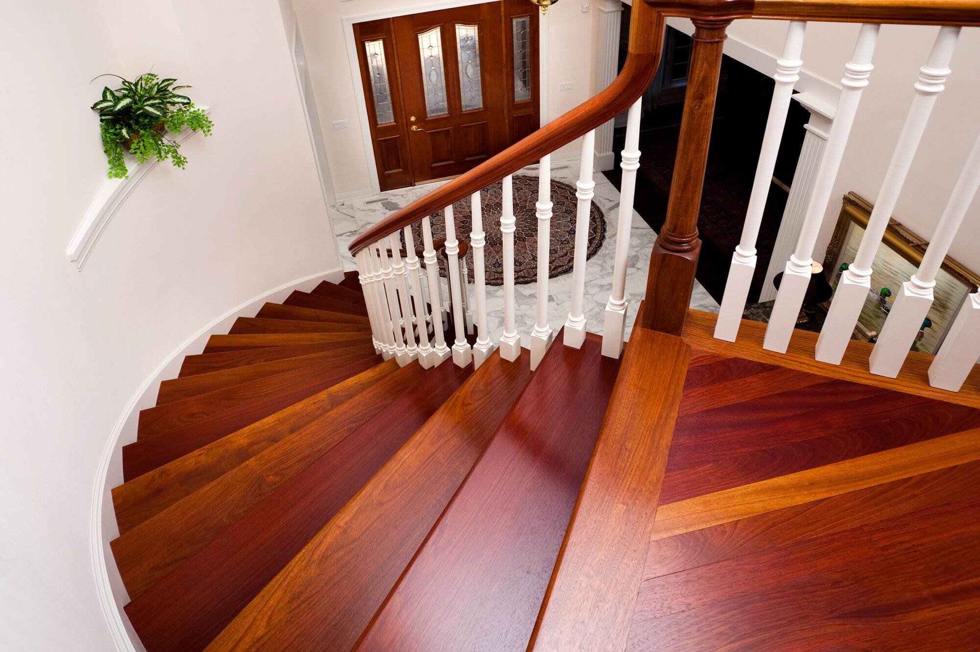Grand Foyer Down Beautiful Winding Hardwood Staircase in Showcase Home